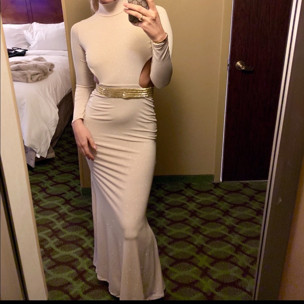 Custom designed long sleeve gown. Belt not included